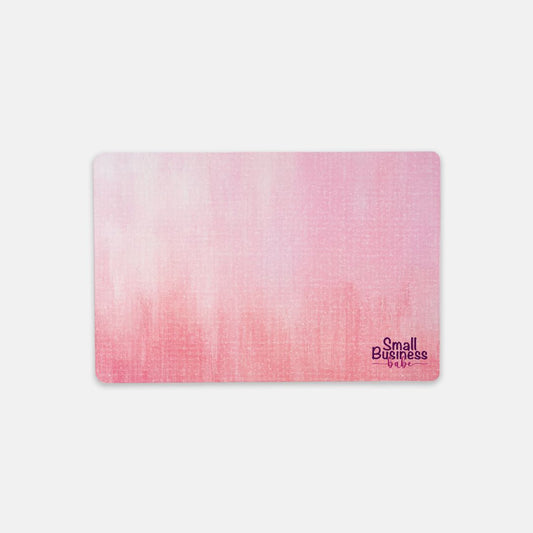 Elevate your workspace with the Desk Mat – Small (18″ x 12″) - Small Business Babe from Designs On The Go. This stylish desk mat features an inspiring design that motivates entrepreneurs. Ideal for home or office, it protects your surfaces while adding a touch of personality, making it perfect for any small business owner.