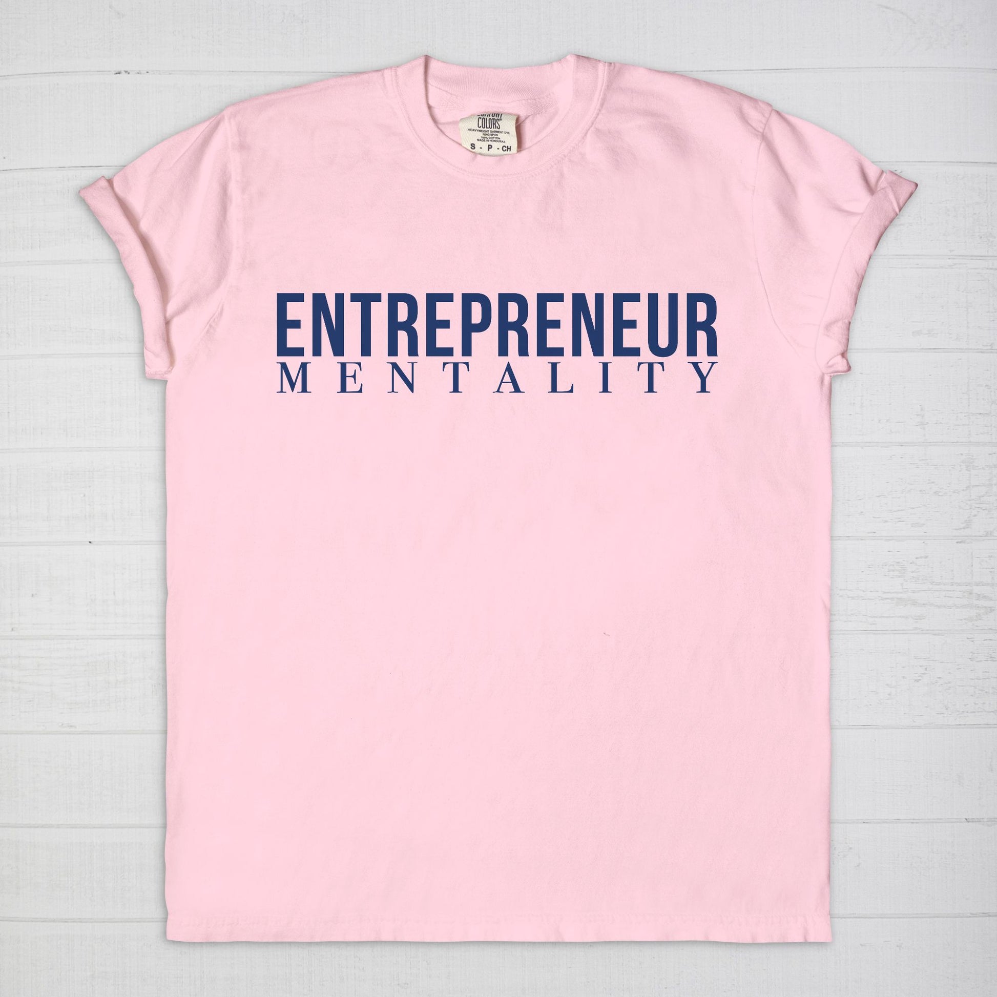 Showcase your drive with the Comfort Color Tee 1717 - Entrepreneur Mentality from Designs On The Go. This comfortable, high-quality tee embodies your ambitious spirit with a sleek design, perfect for daily wear. Elevate your casual wardrobe and inspire success with every step you take.