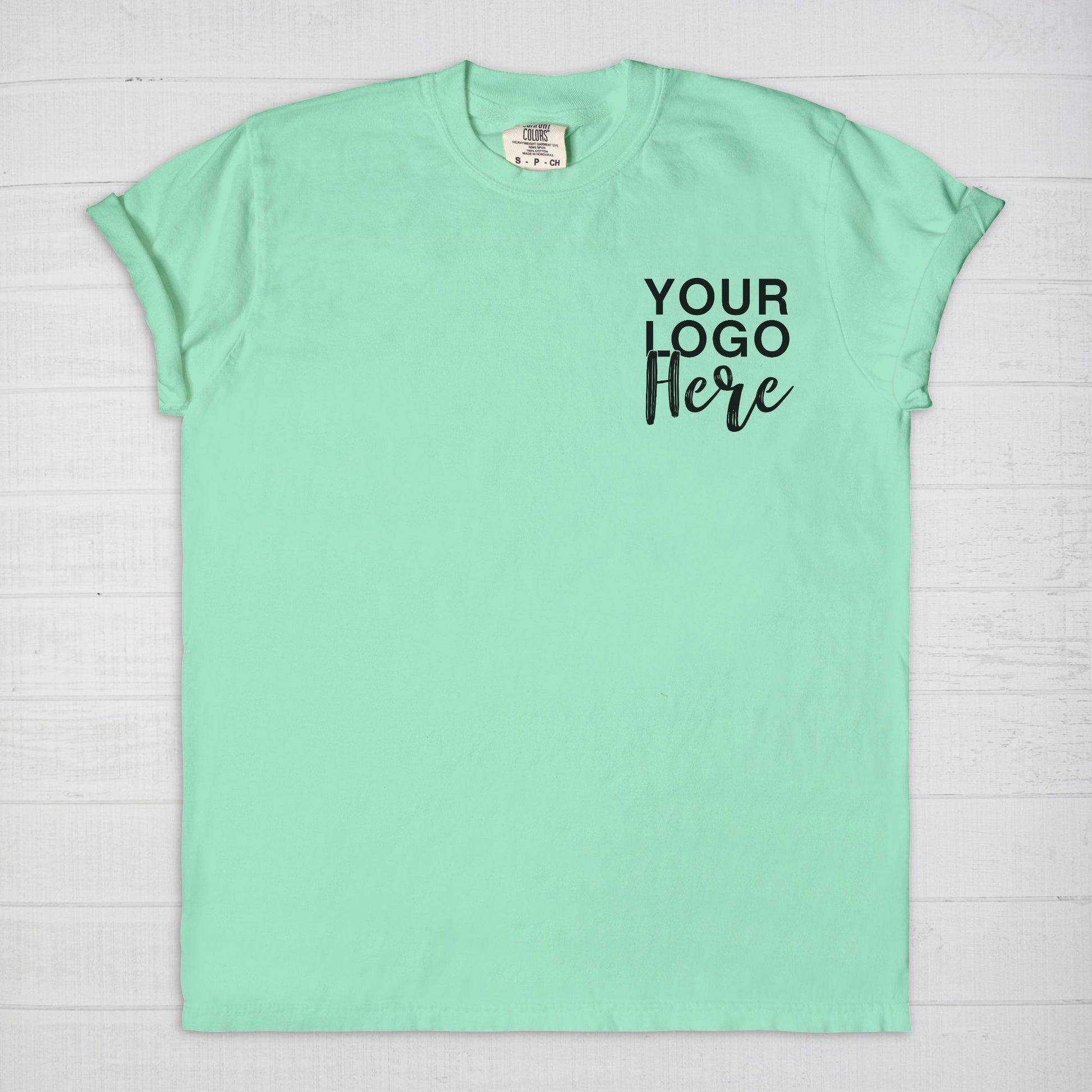 Elevate your style with the Comfort Color Tee 1717 - Logo Only - Front Only from Designs On The Go. This premium tee offers unbeatable comfort and durability. Perfect for everyday wear, it showcases your logo prominently on the front, making a bold statement for your brand.