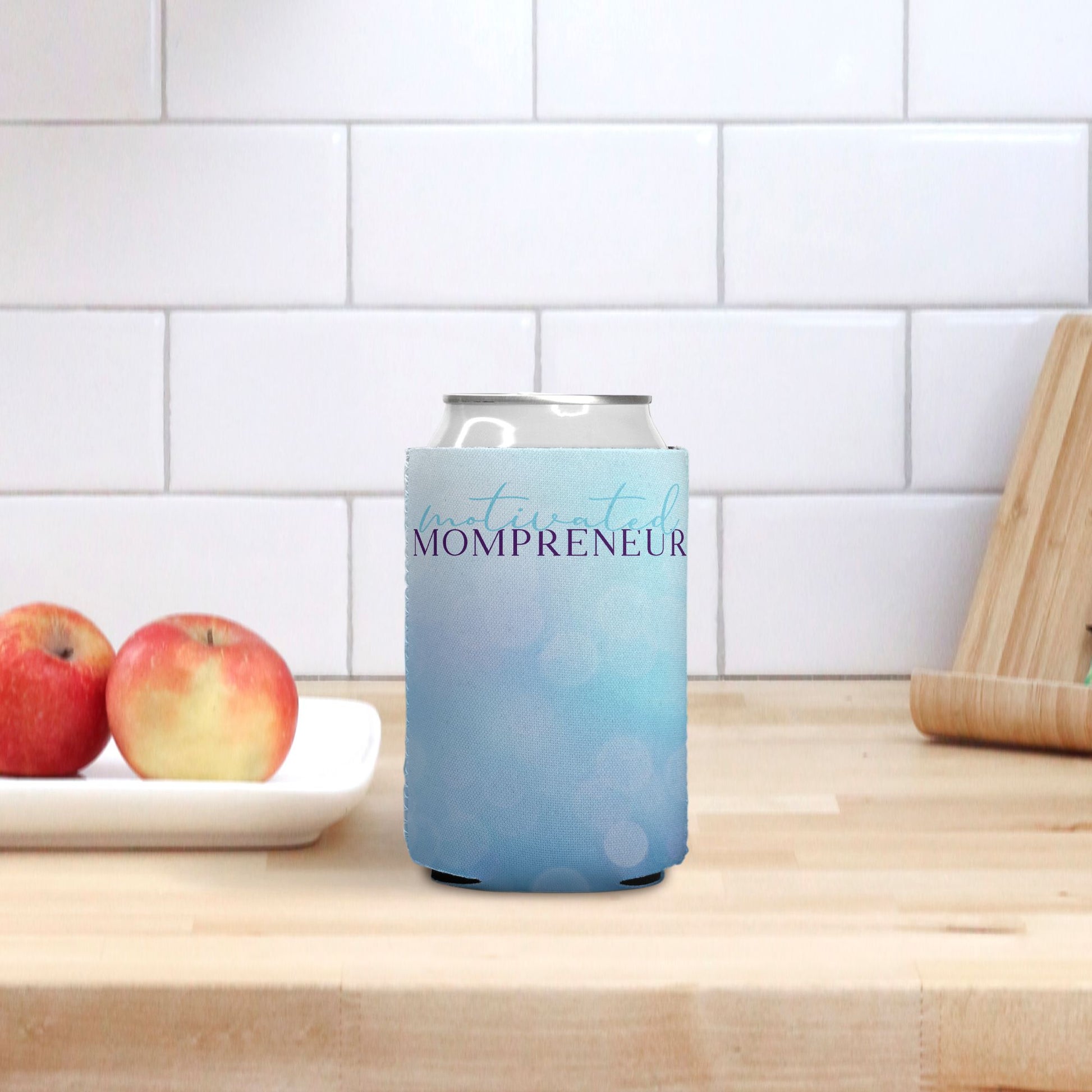 Elevate your style with our Motivated Mompreneur Icy Blue Can Cooler from Designs On The Go. Perfect for keeping your drinks cool while you stay motivated. Ideal for moms on the move who love stylish functionality!