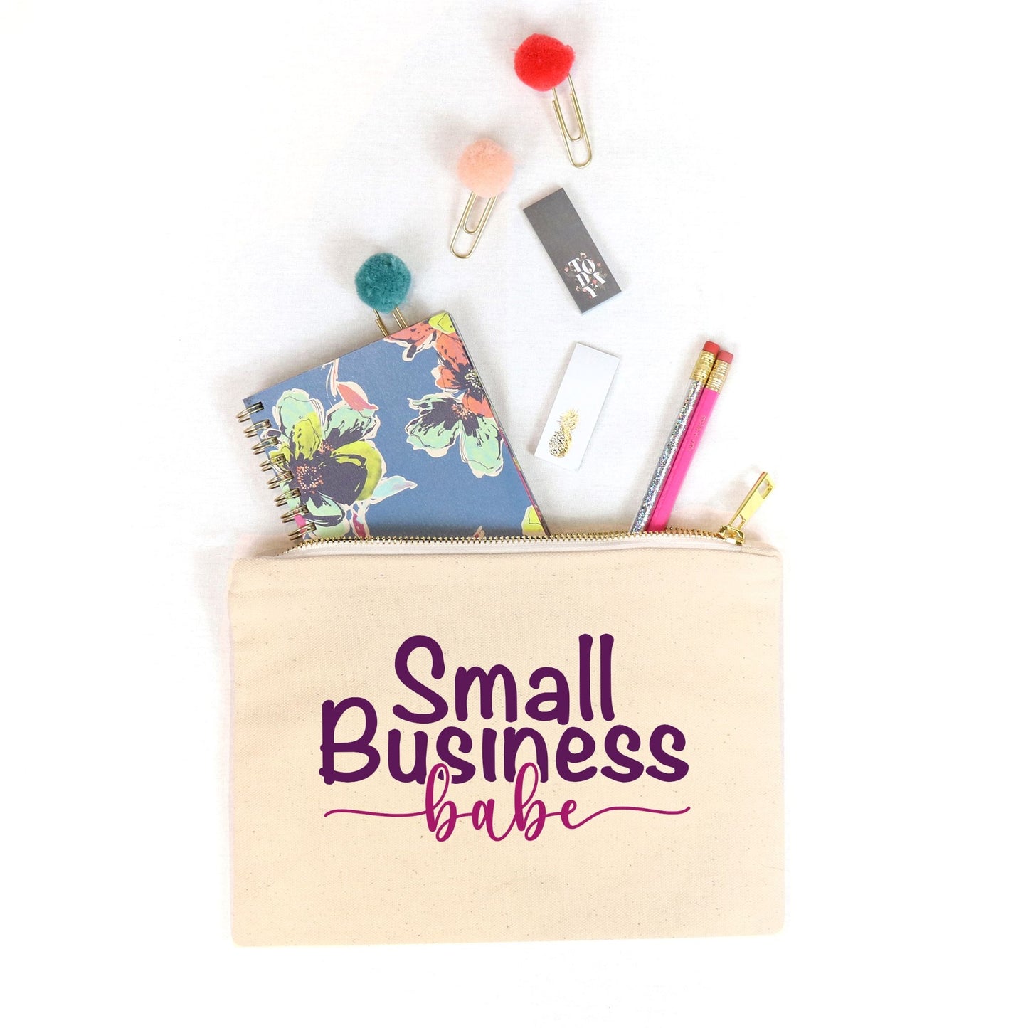 Showcase your small business pride with our Canvas Zipper Bag - Small Business Babe from Designs On The Go. Perfect for organizing your essentials, this durable and stylish bag is ideal for entrepreneurs on the go. Carry your must-haves with confidence and style.