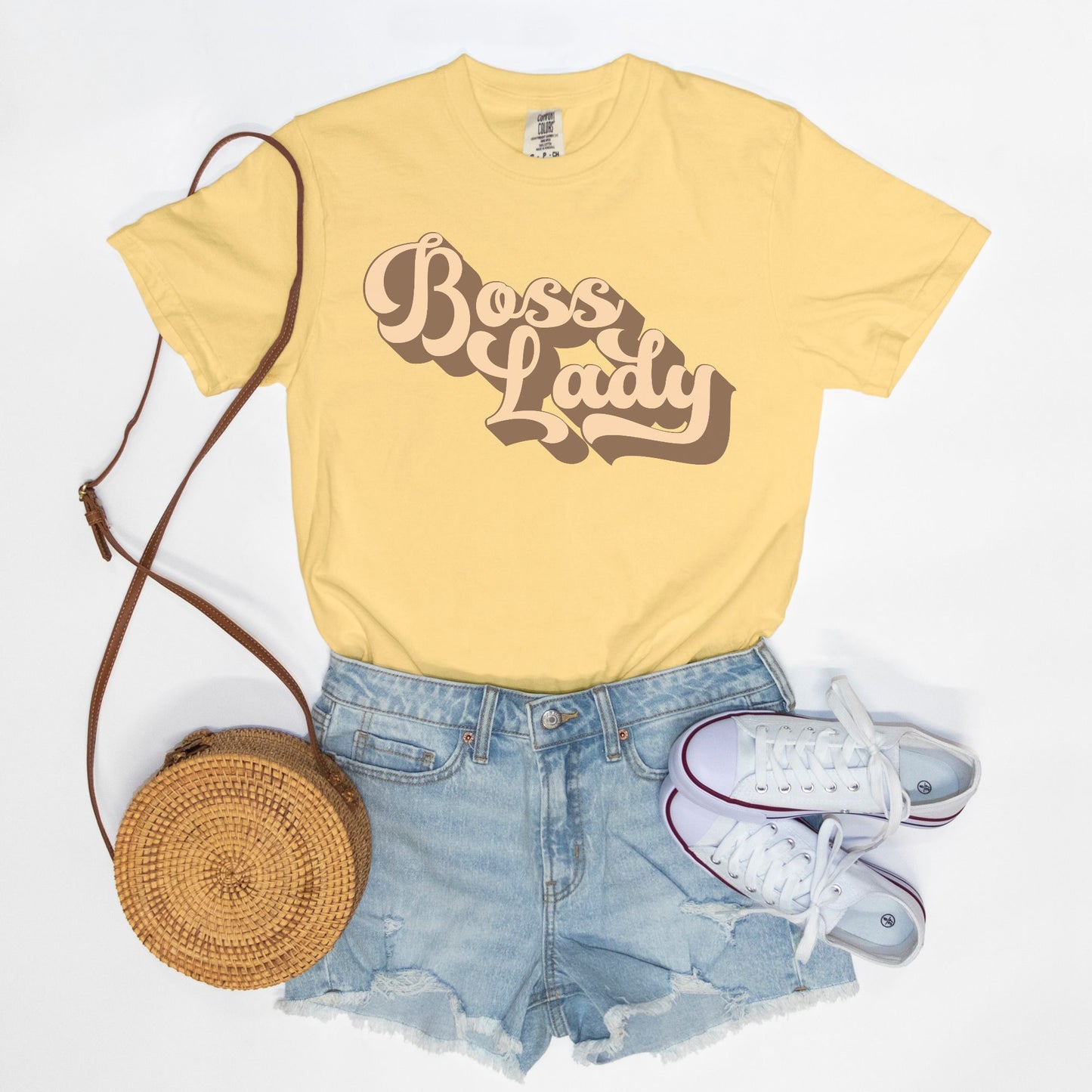 Embrace vintage vibes with the Comfort Color Tee 1717 - Boss Lady Retro from Designs On The Go. This comfy, durable tee boasts a chic, nostalgic design perfect for making a statement. Whether you’re at work or out with friends, this tee combines style and comfort seamlessly.