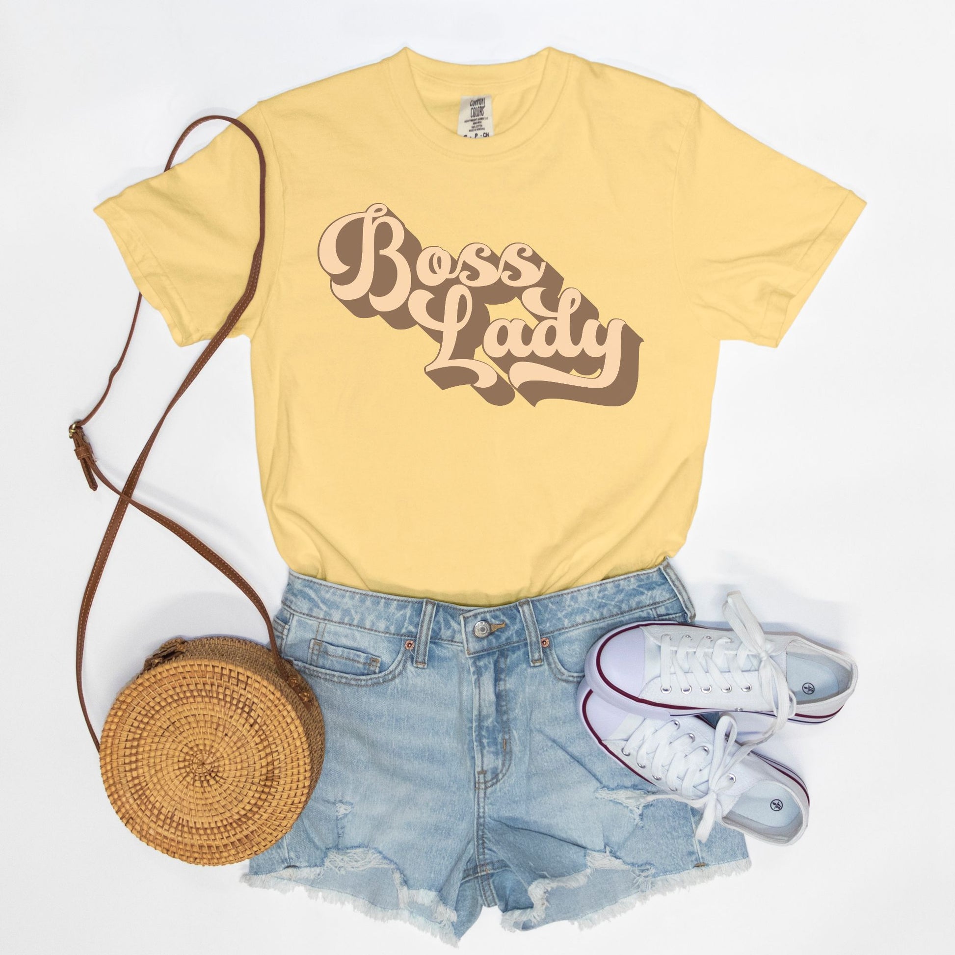 Embrace vintage vibes with the Comfort Color Tee 1717 - Boss Lady Retro from Designs On The Go. This comfy, durable tee boasts a chic, nostalgic design perfect for making a statement. Whether you’re at work or out with friends, this tee combines style and comfort seamlessly.