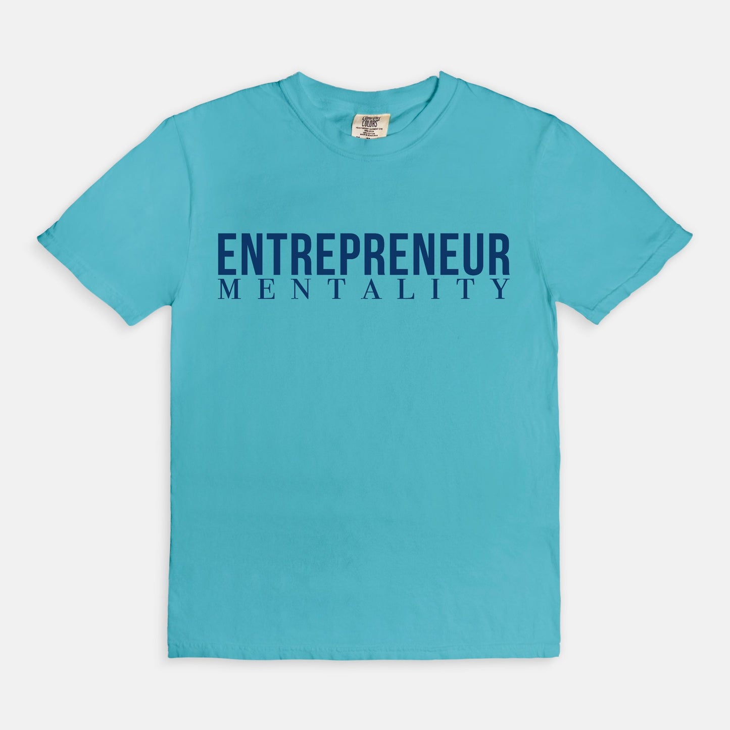 Showcase your drive with the Comfort Color Tee 1717 - Entrepreneur Mentality from Designs On The Go. This comfortable, high-quality tee embodies your ambitious spirit with a sleek design, perfect for daily wear. Elevate your casual wardrobe and inspire success with every step you take.