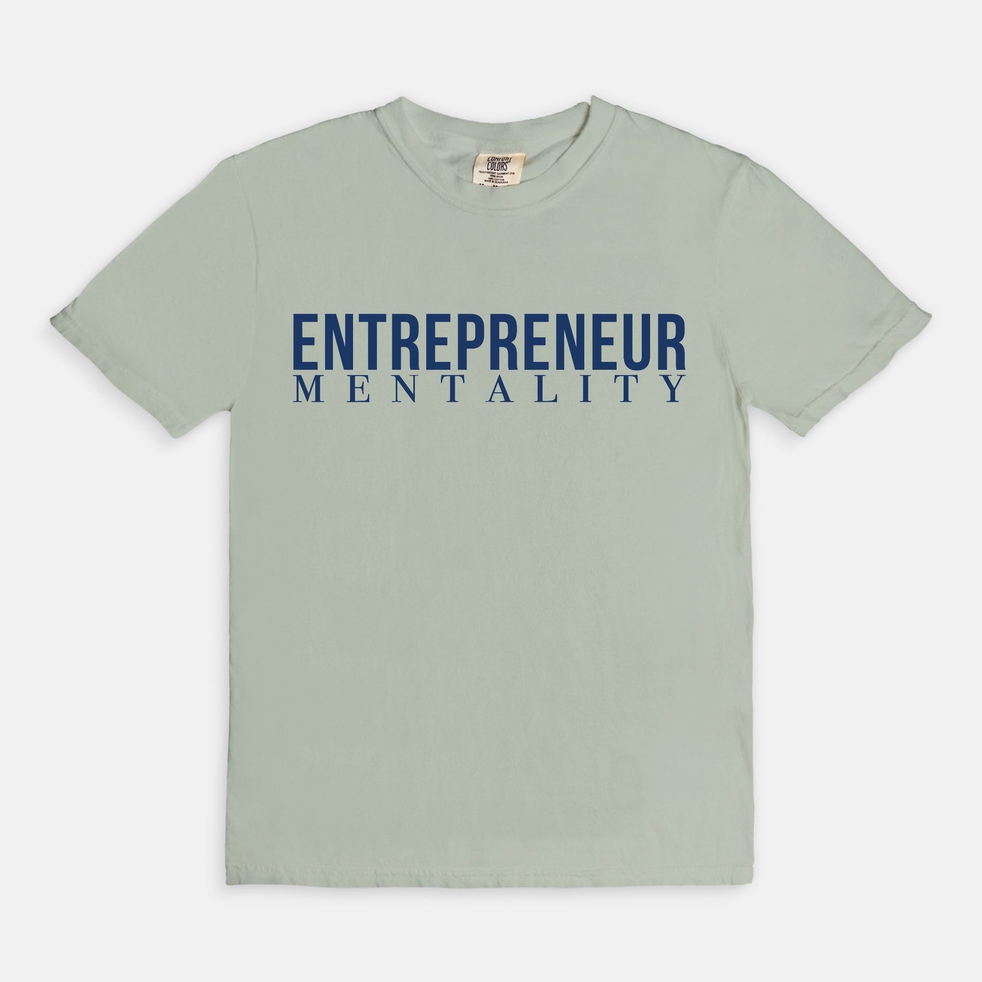 Showcase your drive with the Comfort Color Tee 1717 - Entrepreneur Mentality from Designs On The Go. This comfortable, high-quality tee embodies your ambitious spirit with a sleek design, perfect for daily wear. Elevate your casual wardrobe and inspire success with every step you take.