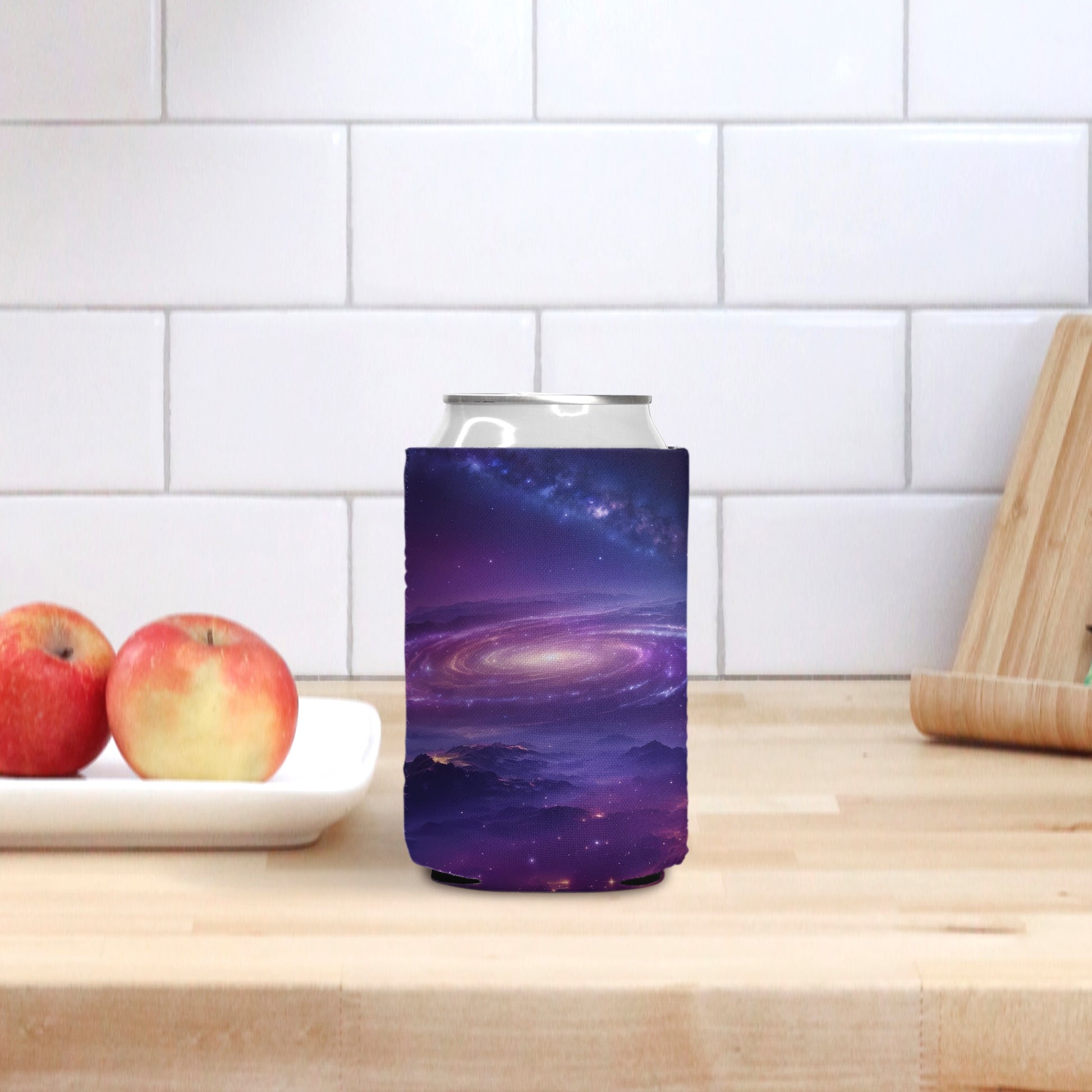 Explore the allure of the cosmos with our Night Sky Mountains Can Cooler from Designs On The Go. Keep beverages chilled in celestial style, perfect for stargazers and outdoor enthusiasts alike.