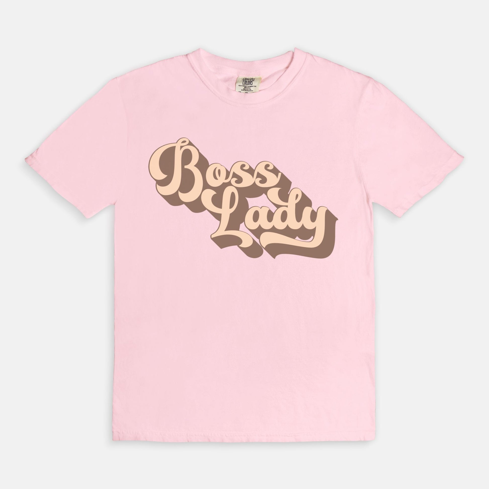 Embrace vintage vibes with the Comfort Color Tee 1717 - Boss Lady Retro from Designs On The Go. This comfy, durable tee boasts a chic, nostalgic design perfect for making a statement. Whether you’re at work or out with friends, this tee combines style and comfort seamlessly.