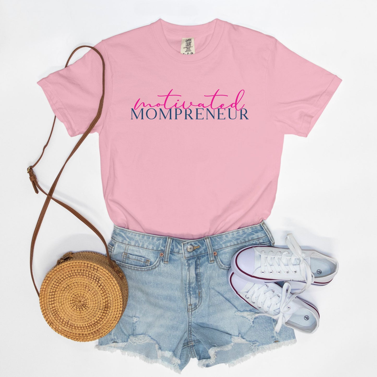 Elevate your entrepreneurial style with the Comfort Color Tee 1717 - Motivated Mompreneur from Designs On The Go. This premium tee offers unmatched comfort and durability, perfect for driven moms balancing business and family. Wear your motivation proudly and inspire others every day!