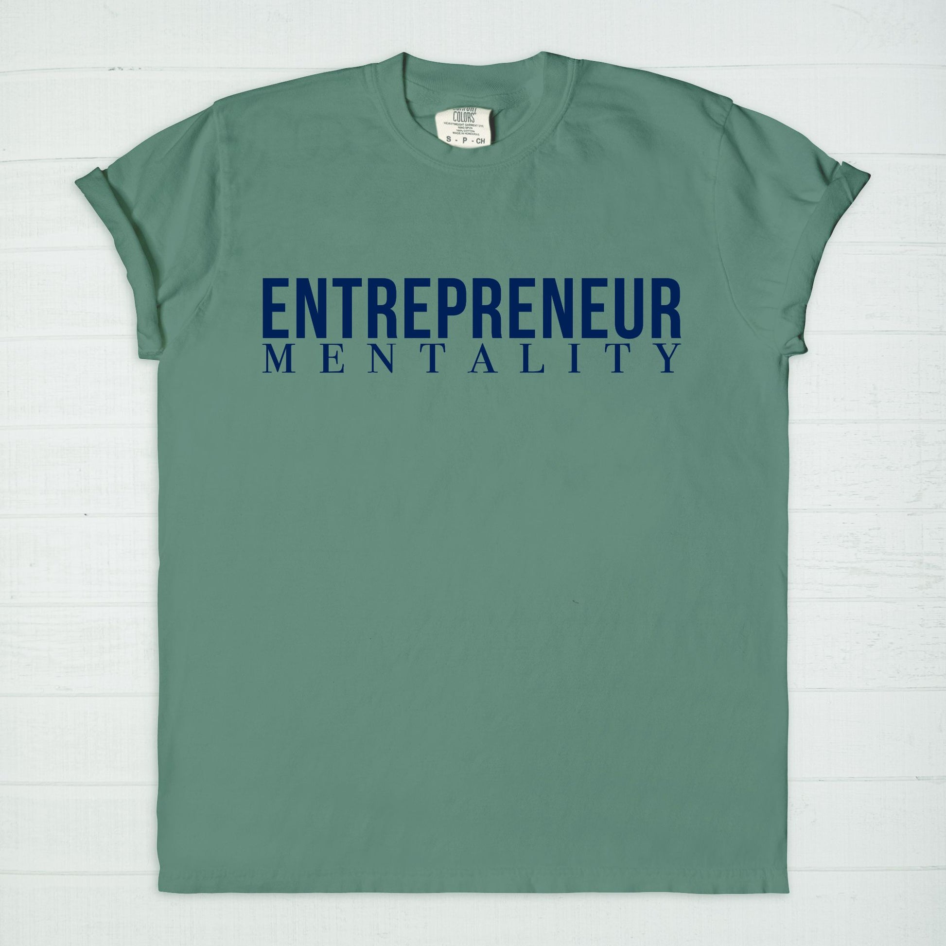 Showcase your drive with the Comfort Color Tee 1717 - Entrepreneur Mentality from Designs On The Go. This comfortable, high-quality tee embodies your ambitious spirit with a sleek design, perfect for daily wear. Elevate your casual wardrobe and inspire success with every step you take.