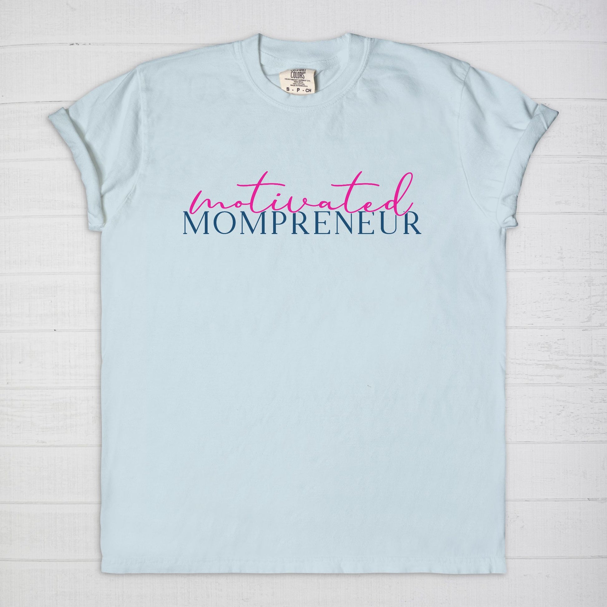 Elevate your entrepreneurial style with the Comfort Color Tee 1717 - Motivated Mompreneur from Designs On The Go. This premium tee offers unmatched comfort and durability, perfect for driven moms balancing business and family. Wear your motivation proudly and inspire others every day!