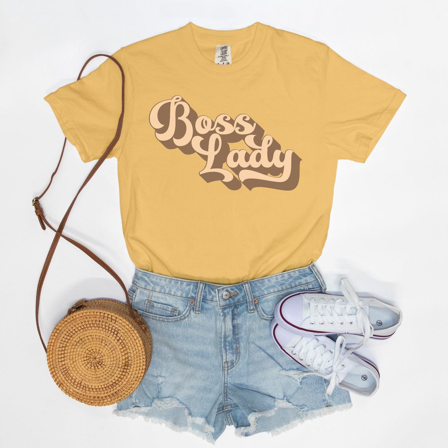 Embrace vintage vibes with the Comfort Color Tee 1717 - Boss Lady Retro from Designs On The Go. This comfy, durable tee boasts a chic, nostalgic design perfect for making a statement. Whether you’re at work or out with friends, this tee combines style and comfort seamlessly.