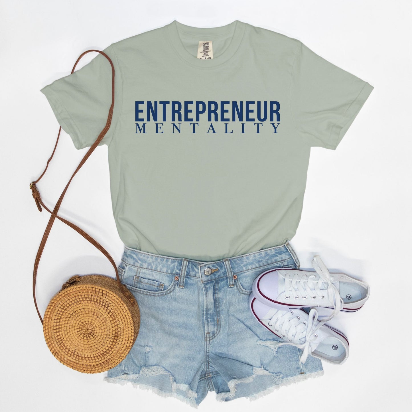 Showcase your drive with the Comfort Color Tee 1717 - Entrepreneur Mentality from Designs On The Go. This comfortable, high-quality tee embodies your ambitious spirit with a sleek design, perfect for daily wear. Elevate your casual wardrobe and inspire success with every step you take.