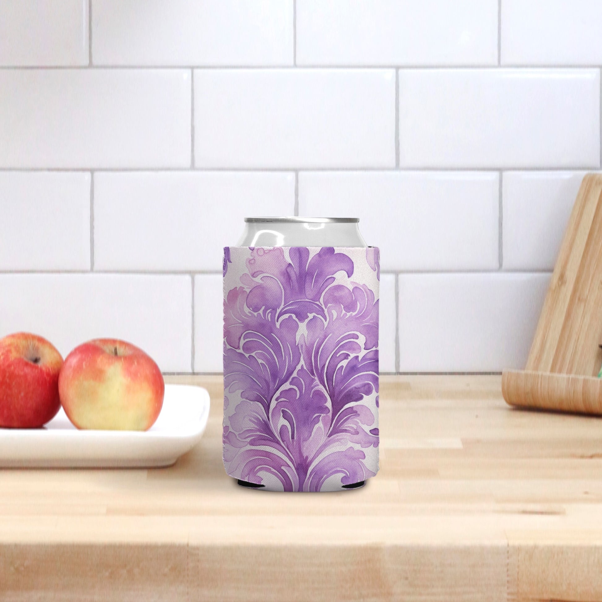 Elevate your drink experience with the Can Cooler - Purple Damask from Designs On The Go. This stylish can cooler features a beautiful purple damask pattern, keeping your beverages cold and your hands dry. Perfect for picnics, parties, and everyday use. Stay cool and classy with Designs On The Go.