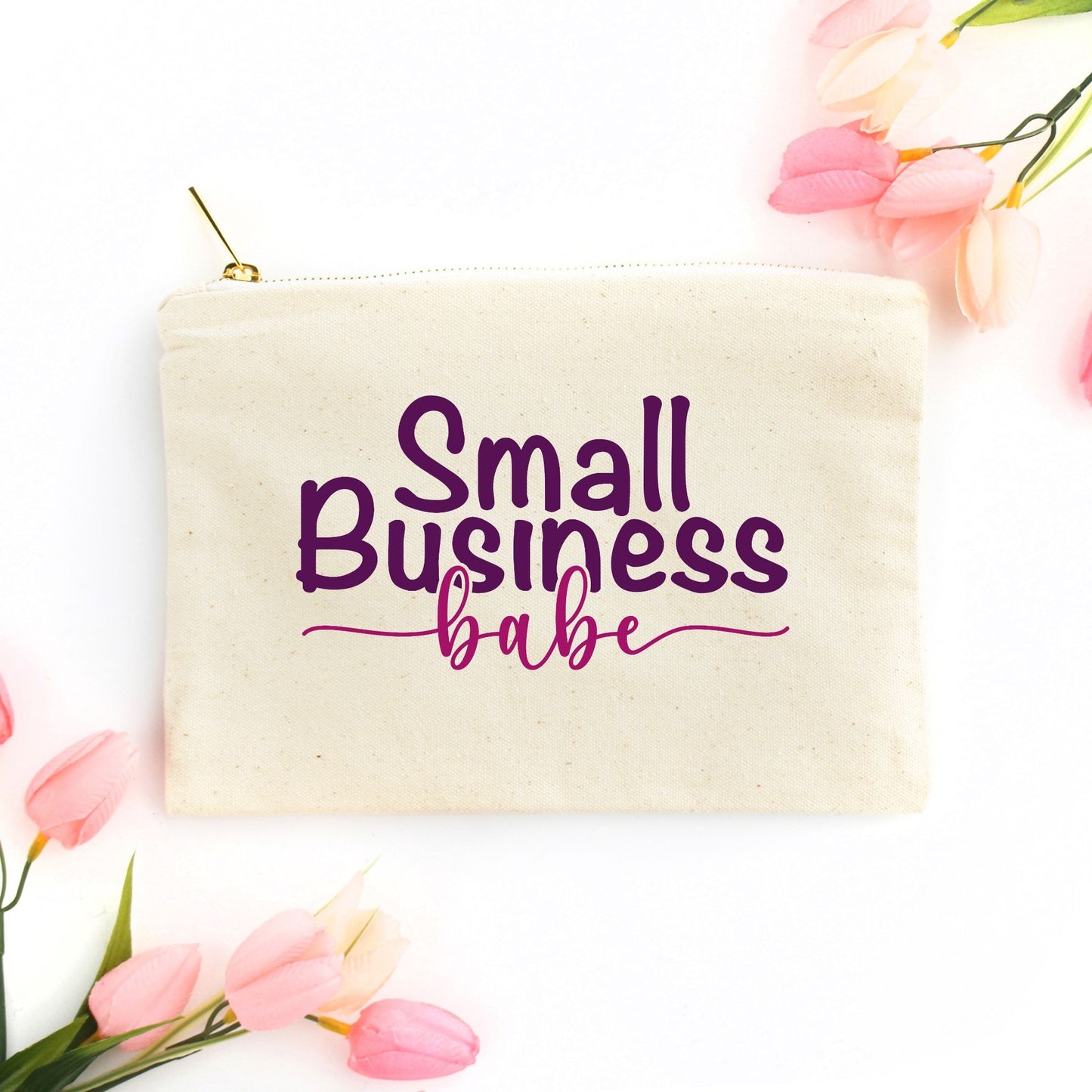 Showcase your small business pride with our Canvas Zipper Bag - Small Business Babe from Designs On The Go. Perfect for organizing your essentials, this durable and stylish bag is ideal for entrepreneurs on the go. Carry your must-haves with confidence and style.