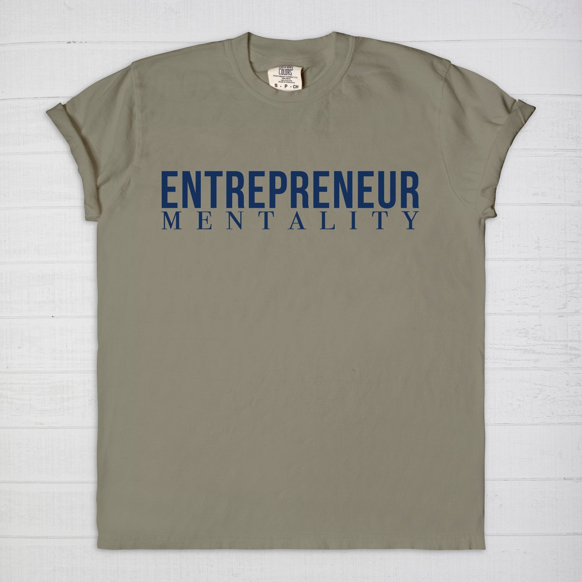 Showcase your drive with the Comfort Color Tee 1717 - Entrepreneur Mentality from Designs On The Go. This comfortable, high-quality tee embodies your ambitious spirit with a sleek design, perfect for daily wear. Elevate your casual wardrobe and inspire success with every step you take.