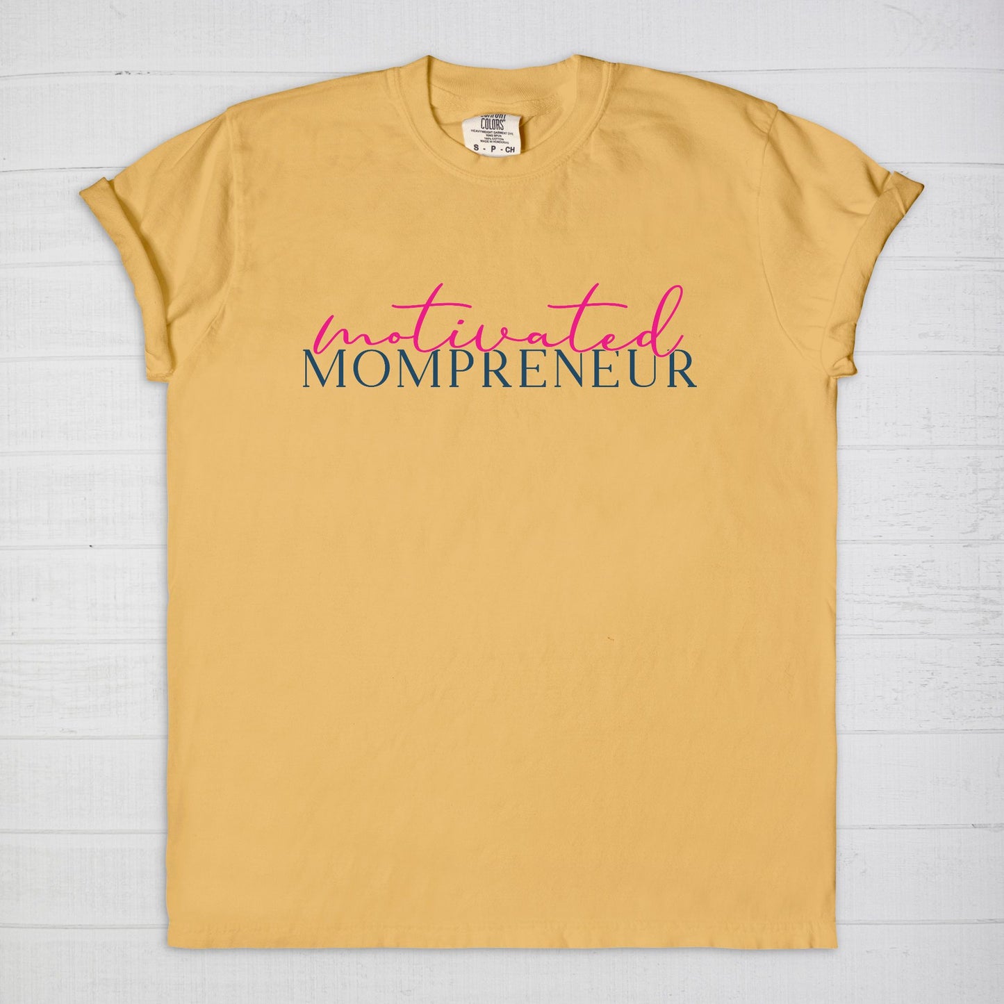 Elevate your entrepreneurial style with the Comfort Color Tee 1717 - Motivated Mompreneur from Designs On The Go. This premium tee offers unmatched comfort and durability, perfect for driven moms balancing business and family. Wear your motivation proudly and inspire others every day!