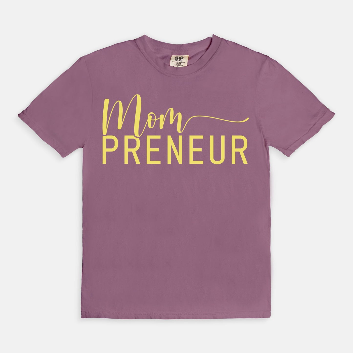 Celebrate your entrepreneurial spirit with the Comfort Color Tee 1717 - Mompreneur from Designs On The Go. This stylish, high-quality tee offers ultimate comfort and durability, perfect for busy moms building their empires. Show off your mompreneur pride in everyday wear!