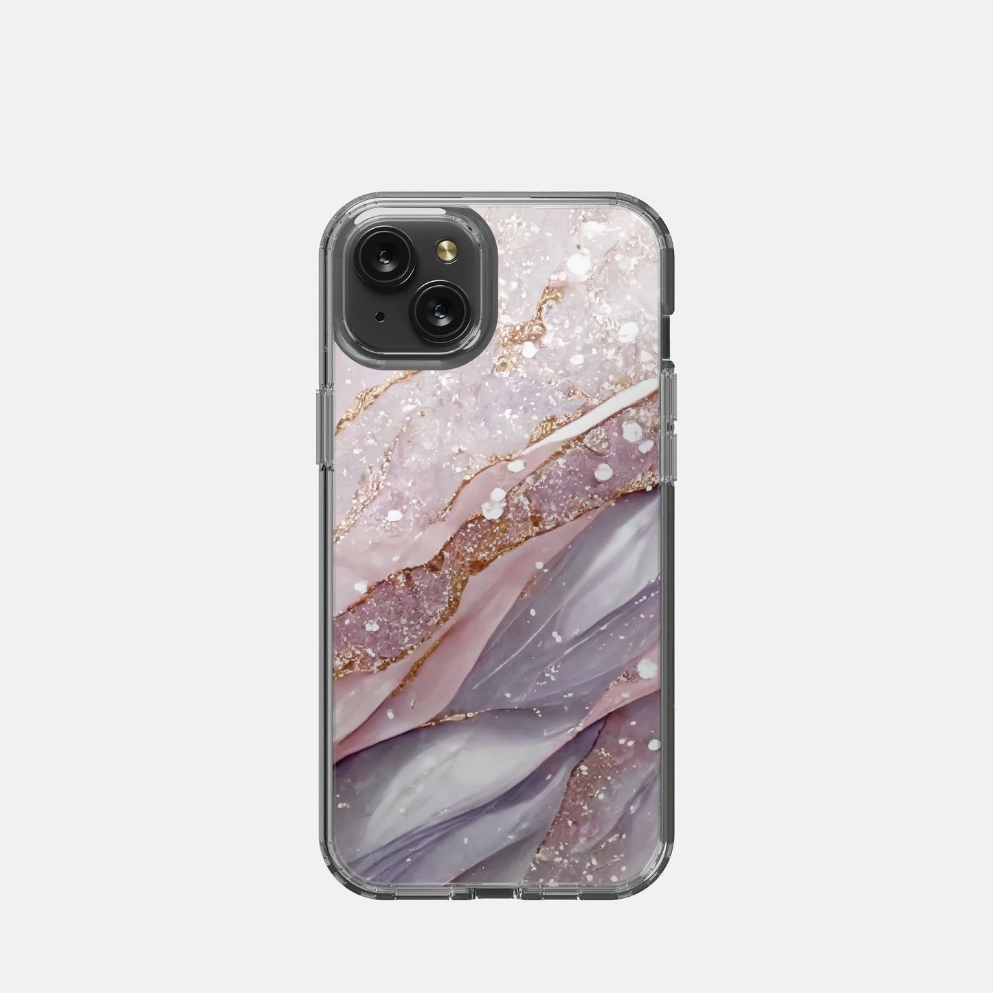 Enhance your iPhone 15 Plus with the Glistening Stone Clear Case from Designs On The Go. This stylish case showcases a shimmering stone pattern that adds elegance to your device while providing robust protection. Lightweight, durable, and perfect for those who appreciate a blend of fashion and functionality.