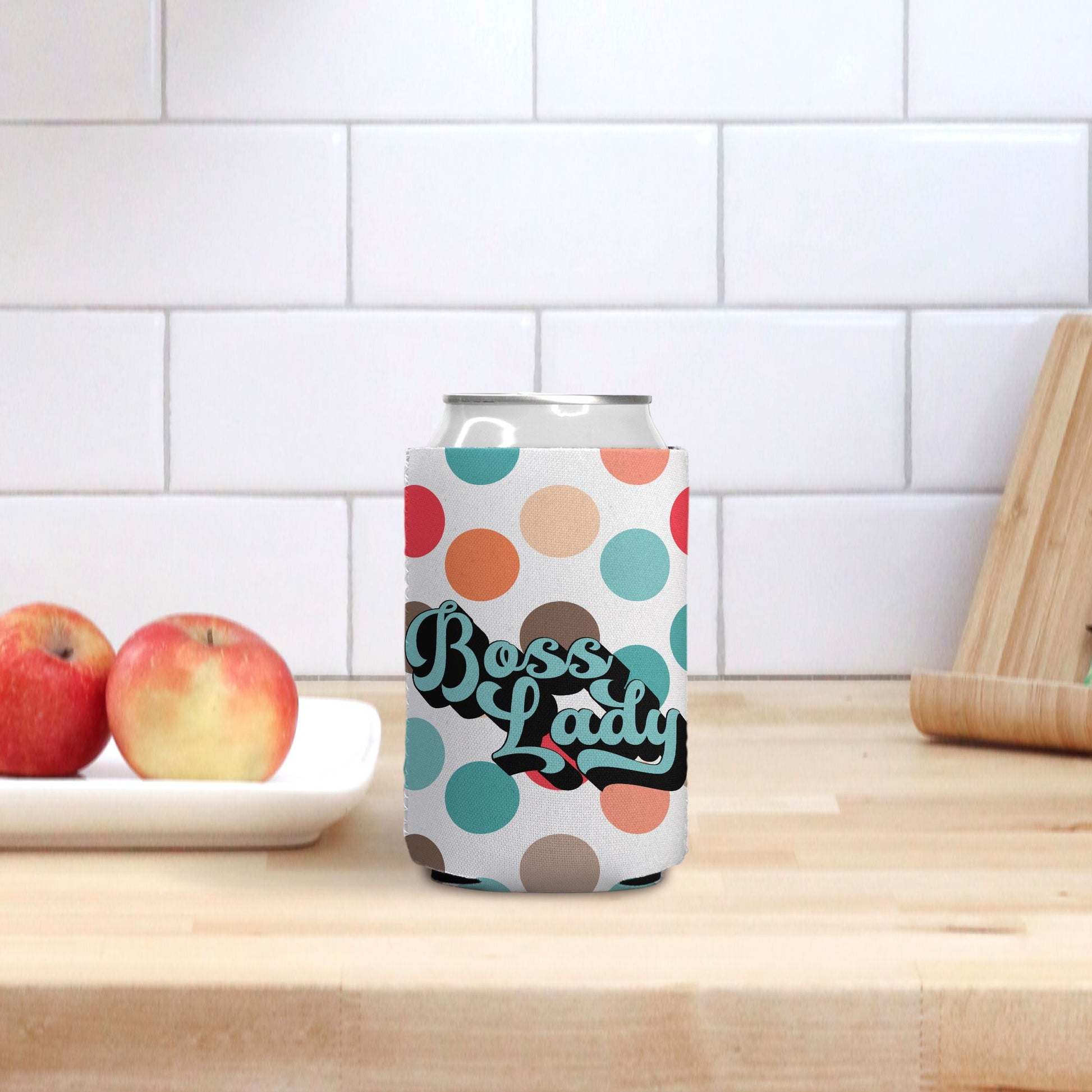 Keep your drinks chilled in style with the Boss Lady Retro Polka Dot Can Cooler from Designs On The Go. This cooler features a playful polka dot design, perfect for any occasion. It's the ideal accessory for picnics, parties, and outdoor adventures. Stay cool and stylish with this unique can cooler!