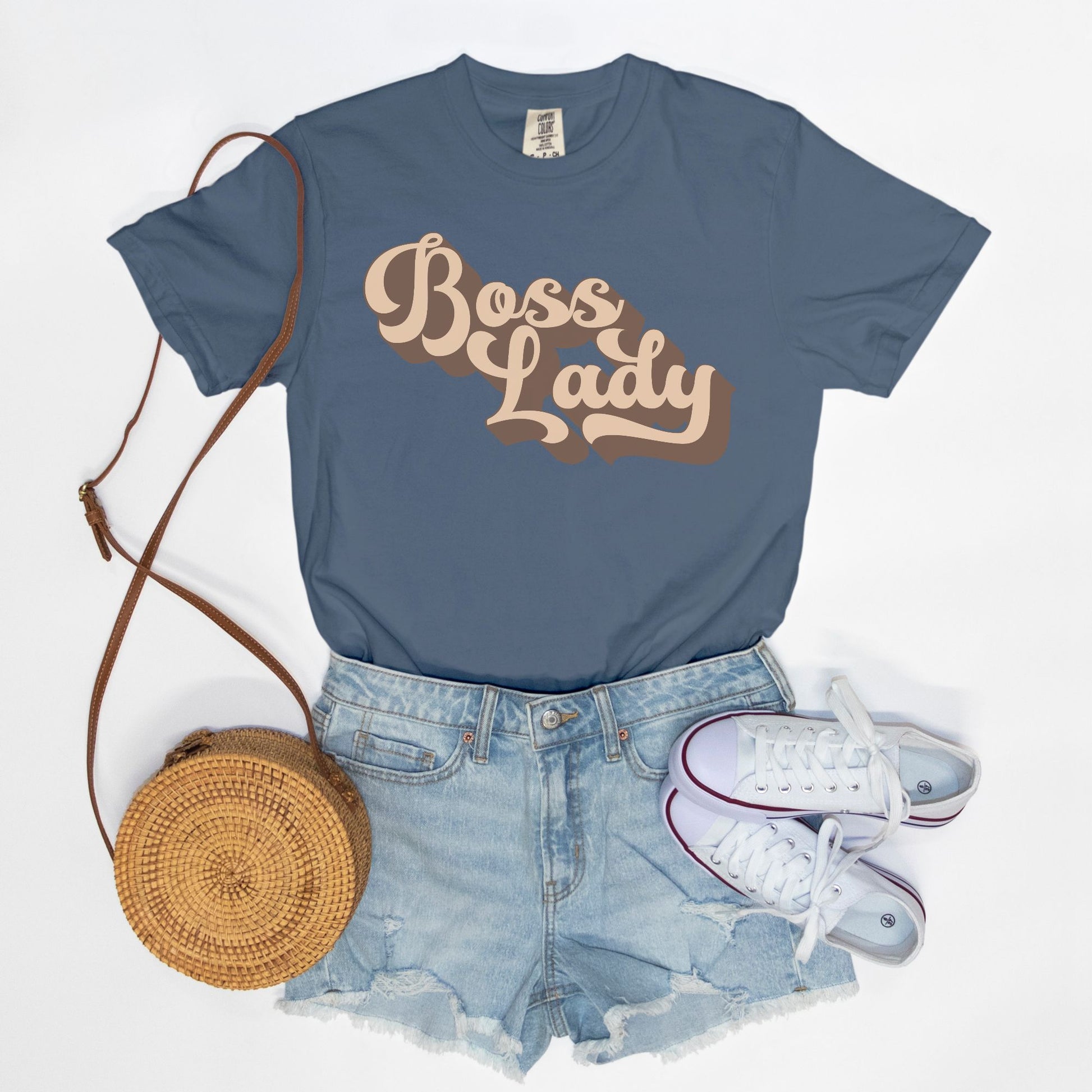 Embrace vintage vibes with the Comfort Color Tee 1717 - Boss Lady Retro from Designs On The Go. This comfy, durable tee boasts a chic, nostalgic design perfect for making a statement. Whether you’re at work or out with friends, this tee combines style and comfort seamlessly.