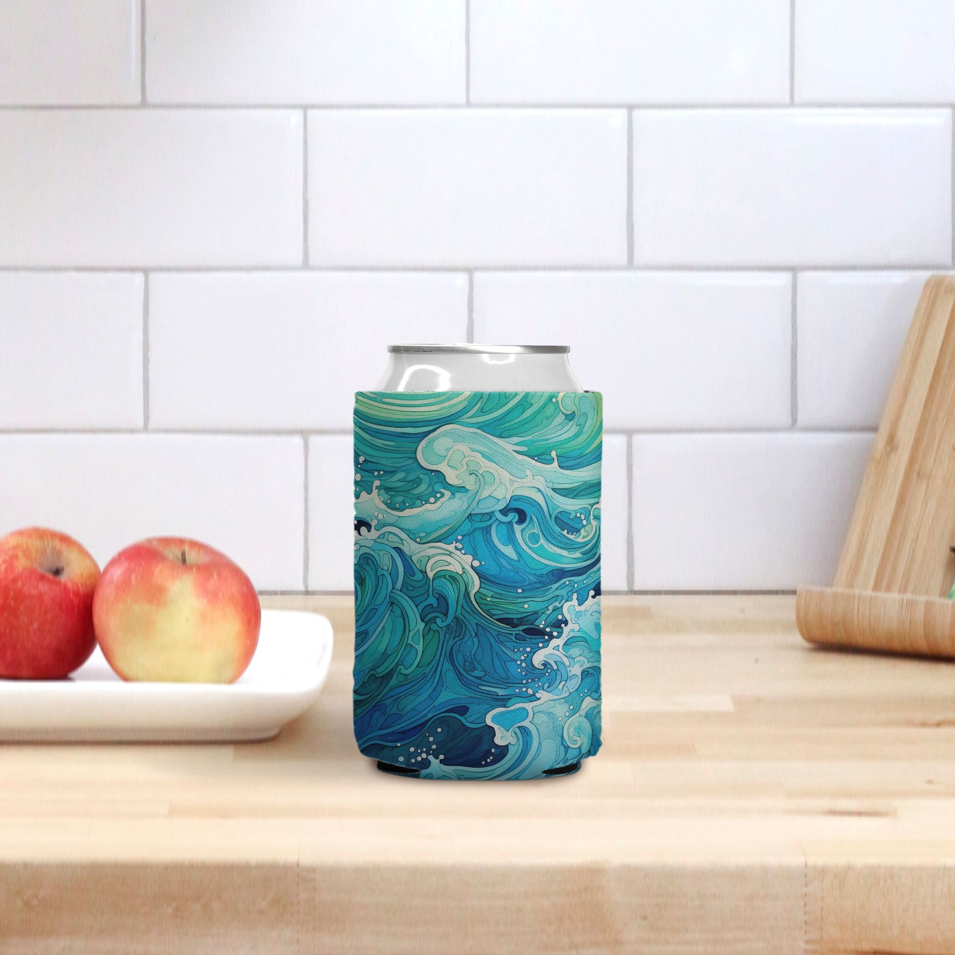 Chill in style with the Aqua Waves Can Cooler from Designs On The Go. Featuring a stunning aqua wave design, this can cooler keeps your drinks icy cold and your hands dry. Perfect for beach days, picnics, and outdoor adventures. Stay refreshed and fashionable with this must-have accessory.