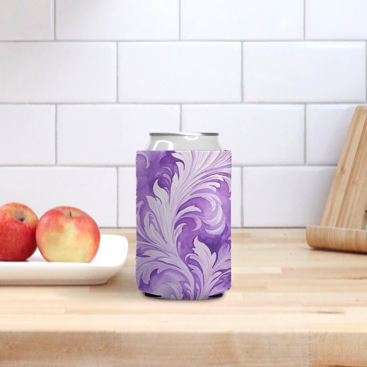 Enhance your beverage experience with our Can Cooler - Swirly Feathers from Designs On The Go. Featuring a whimsical feather design, this cooler keeps drinks cool and hands dry. Ideal for outdoor events and gatherings. Elevate your style and keep refreshments at the perfect temperature with Designs On The Go.