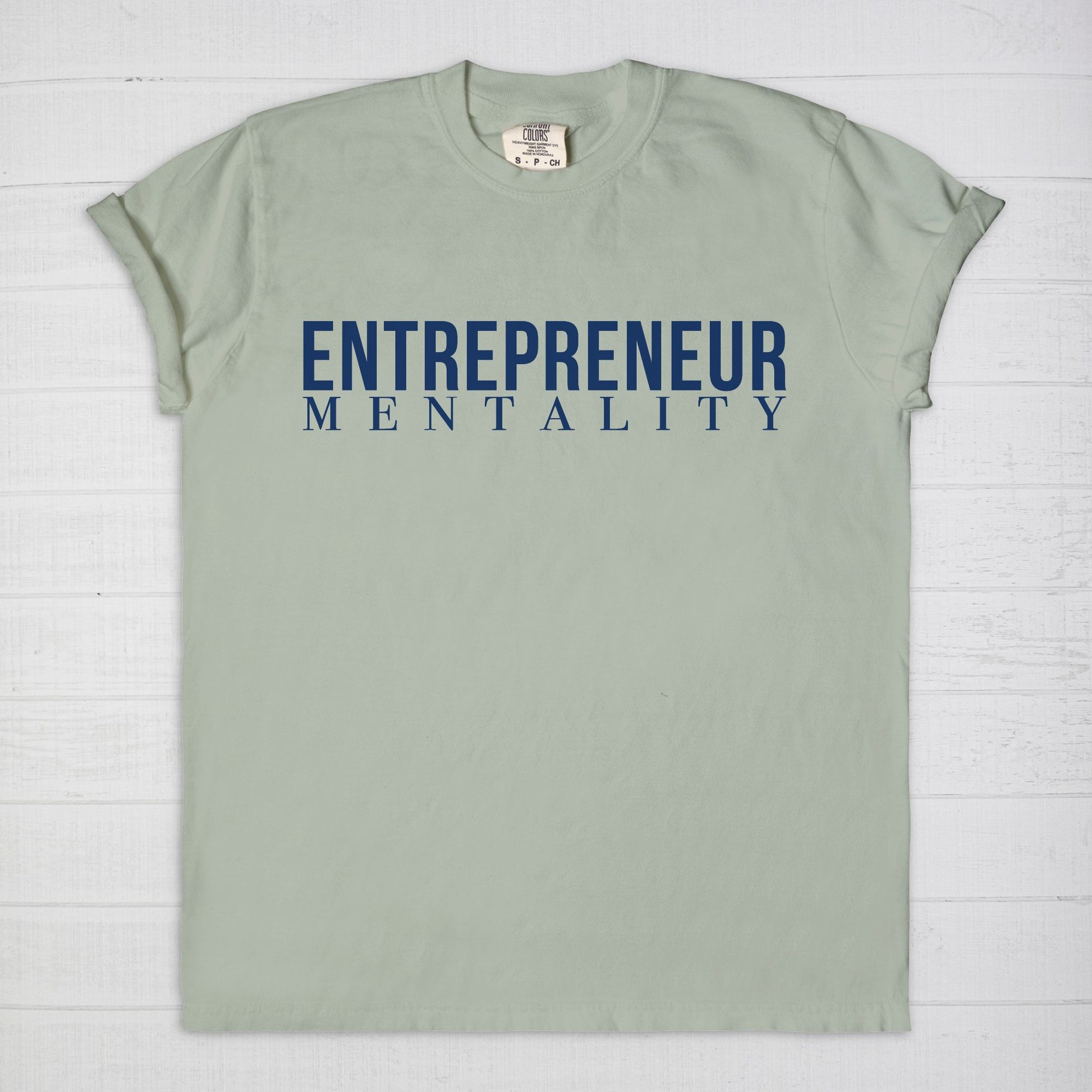 Showcase your drive with the Comfort Color Tee 1717 - Entrepreneur Mentality from Designs On The Go. This comfortable, high-quality tee embodies your ambitious spirit with a sleek design, perfect for daily wear. Elevate your casual wardrobe and inspire success with every step you take.