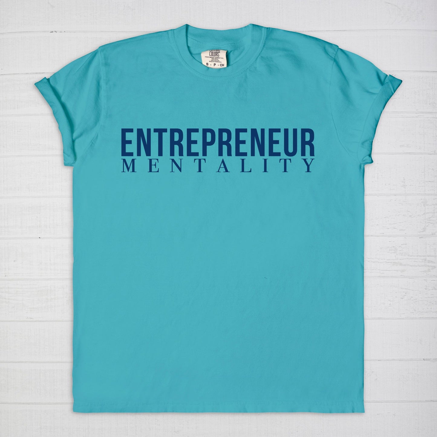 Showcase your drive with the Comfort Color Tee 1717 - Entrepreneur Mentality from Designs On The Go. This comfortable, high-quality tee embodies your ambitious spirit with a sleek design, perfect for daily wear. Elevate your casual wardrobe and inspire success with every step you take.