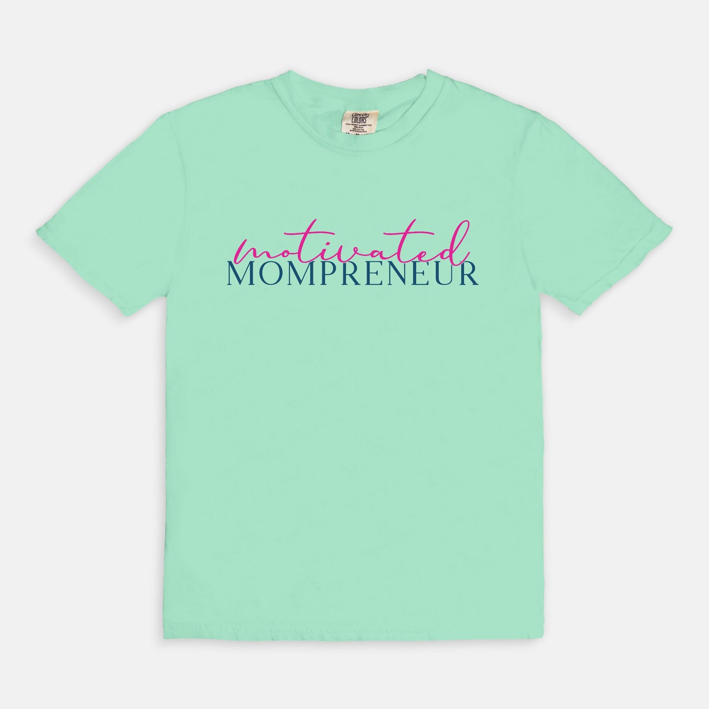 Elevate your entrepreneurial style with the Comfort Color Tee 1717 - Motivated Mompreneur from Designs On The Go. This premium tee offers unmatched comfort and durability, perfect for driven moms balancing business and family. Wear your motivation proudly and inspire others every day!