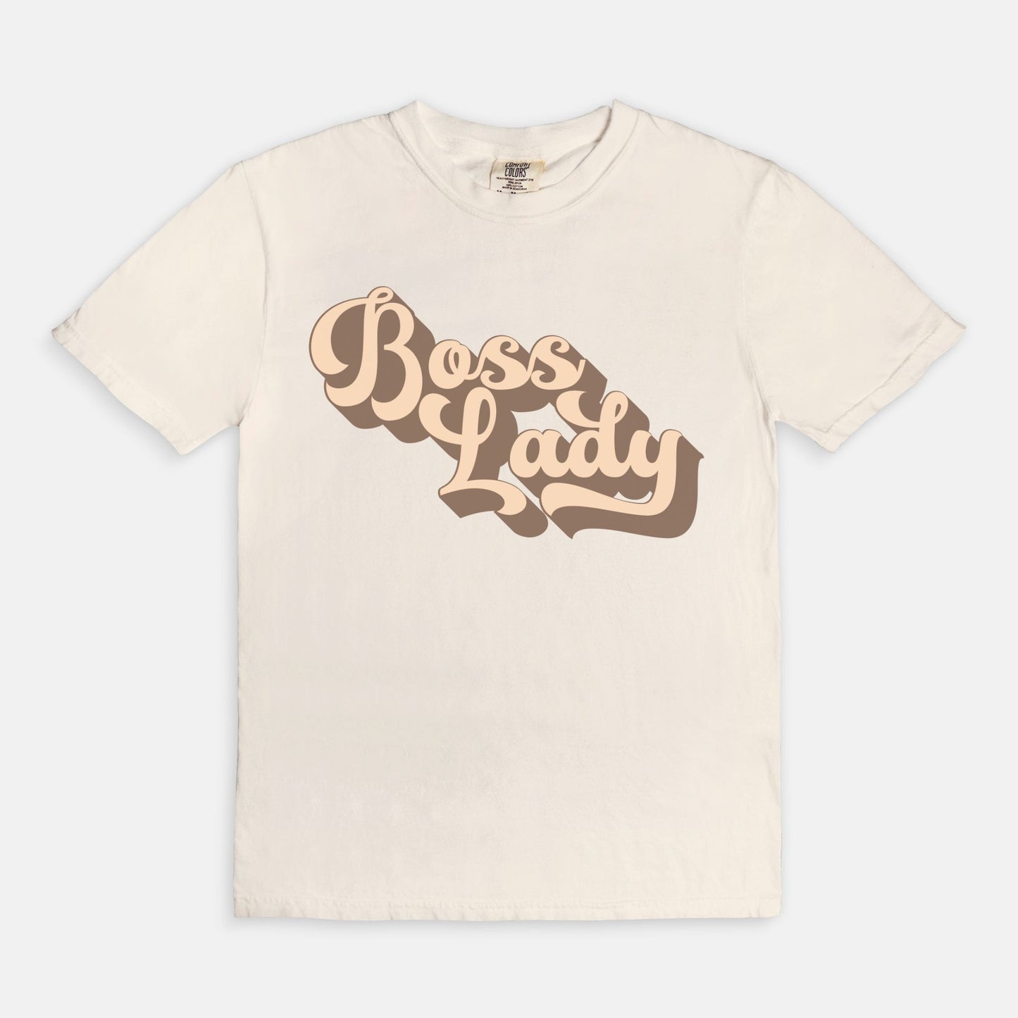 Embrace vintage vibes with the Comfort Color Tee 1717 - Boss Lady Retro from Designs On The Go. This comfy, durable tee boasts a chic, nostalgic design perfect for making a statement. Whether you’re at work or out with friends, this tee combines style and comfort seamlessly.