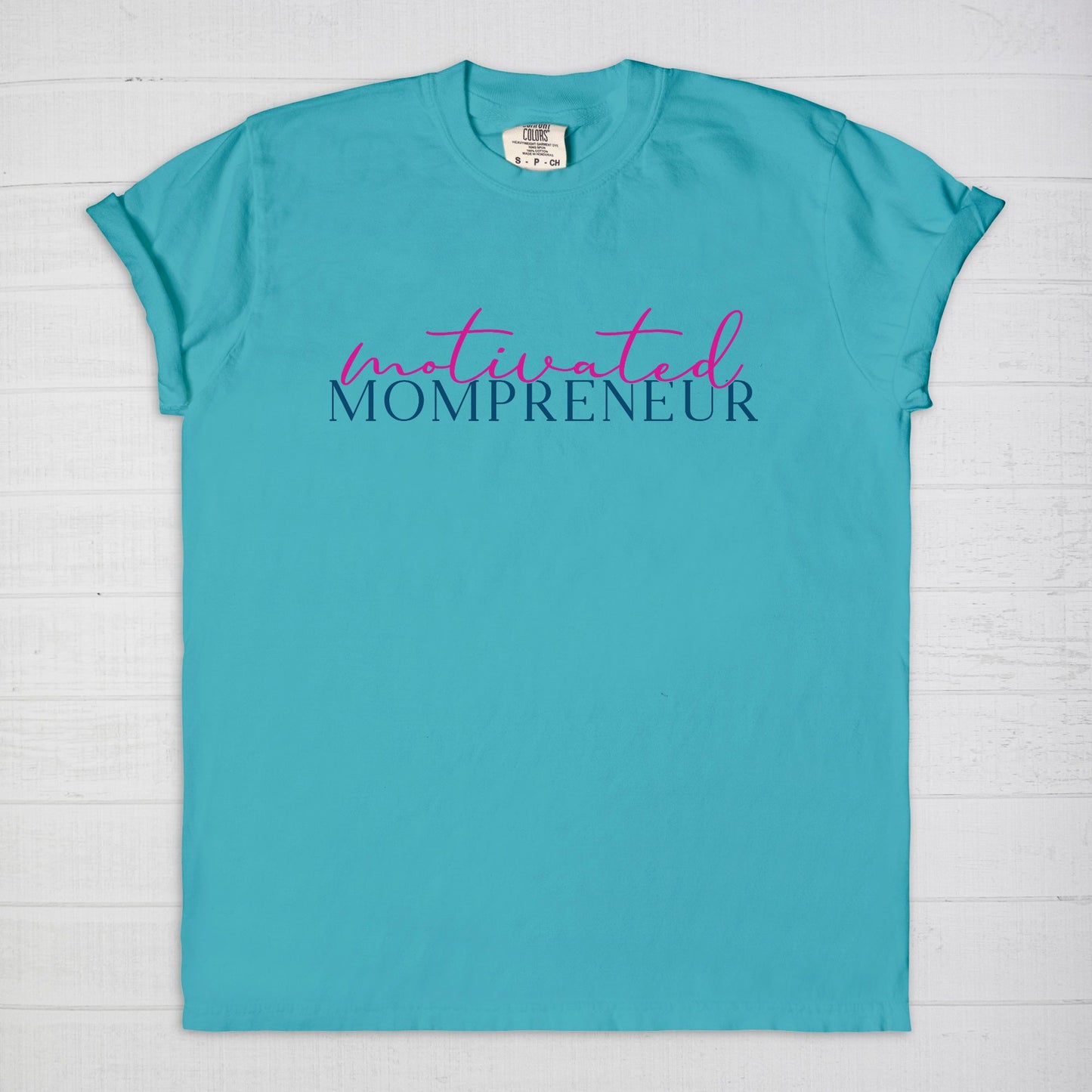 Elevate your entrepreneurial style with the Comfort Color Tee 1717 - Motivated Mompreneur from Designs On The Go. This premium tee offers unmatched comfort and durability, perfect for driven moms balancing business and family. Wear your motivation proudly and inspire others every day!