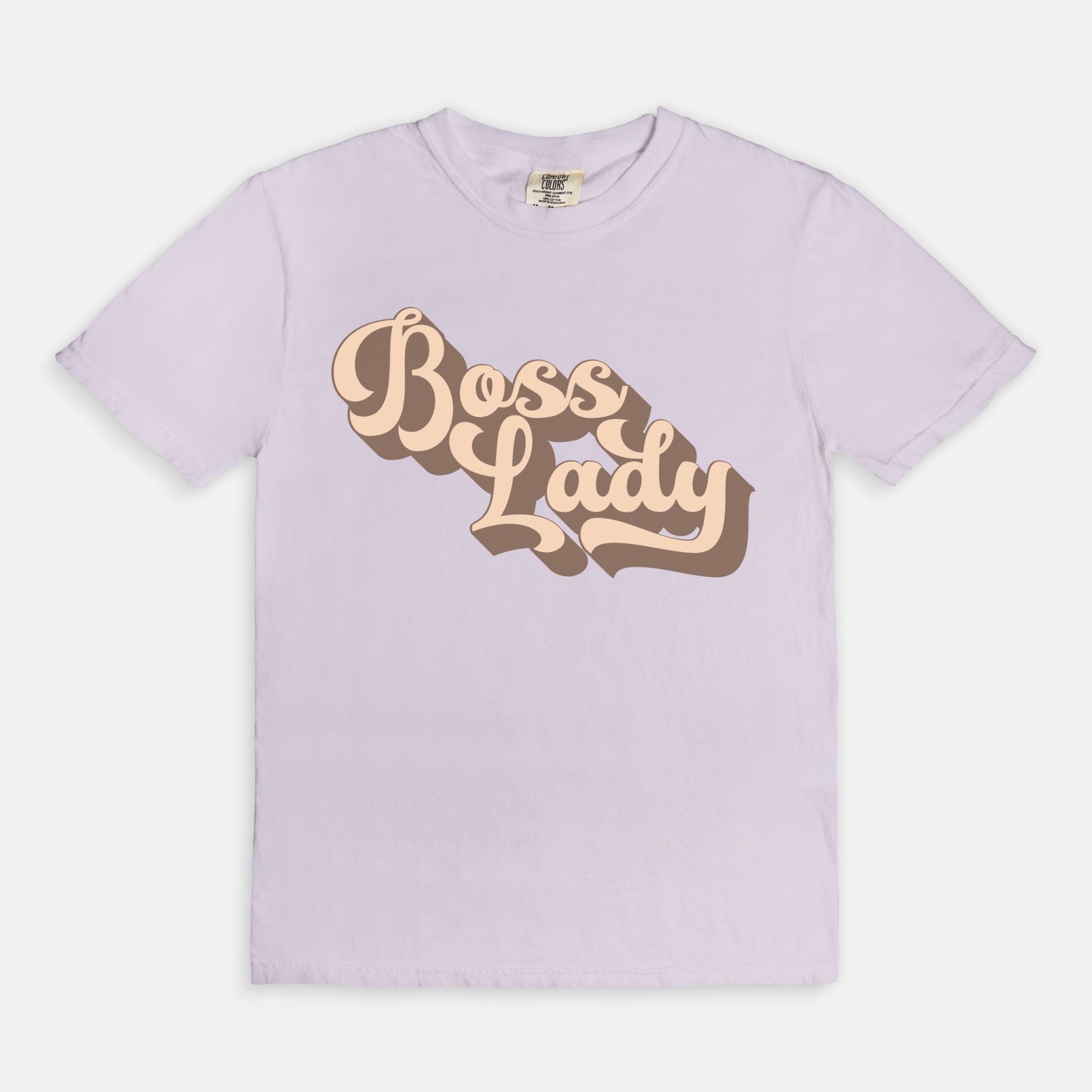 Embrace vintage vibes with the Comfort Color Tee 1717 - Boss Lady Retro from Designs On The Go. This comfy, durable tee boasts a chic, nostalgic design perfect for making a statement. Whether you’re at work or out with friends, this tee combines style and comfort seamlessly.