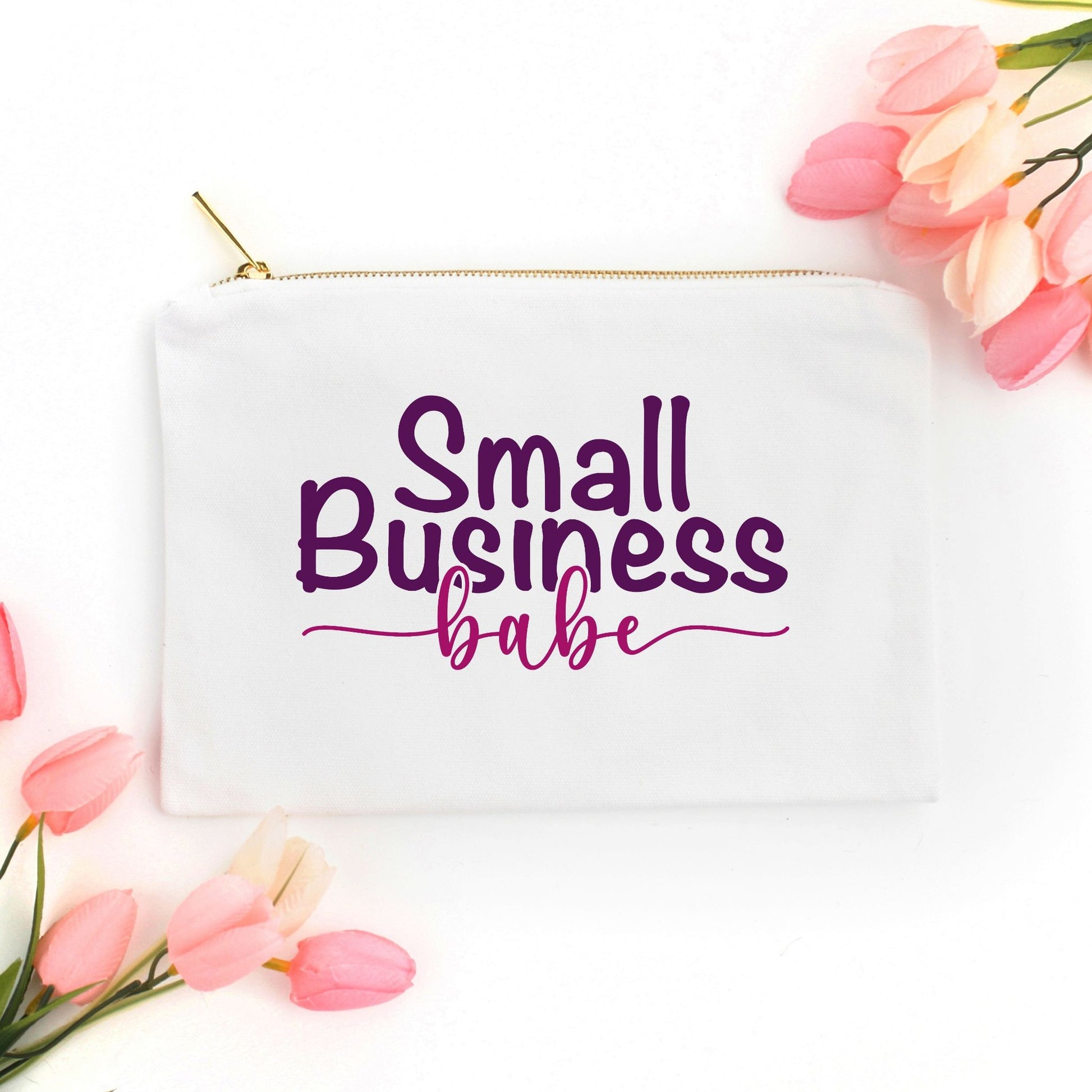 Showcase your small business pride with our Canvas Zipper Bag - Small Business Babe from Designs On The Go. Perfect for organizing your essentials, this durable and stylish bag is ideal for entrepreneurs on the go. Carry your must-haves with confidence and style.