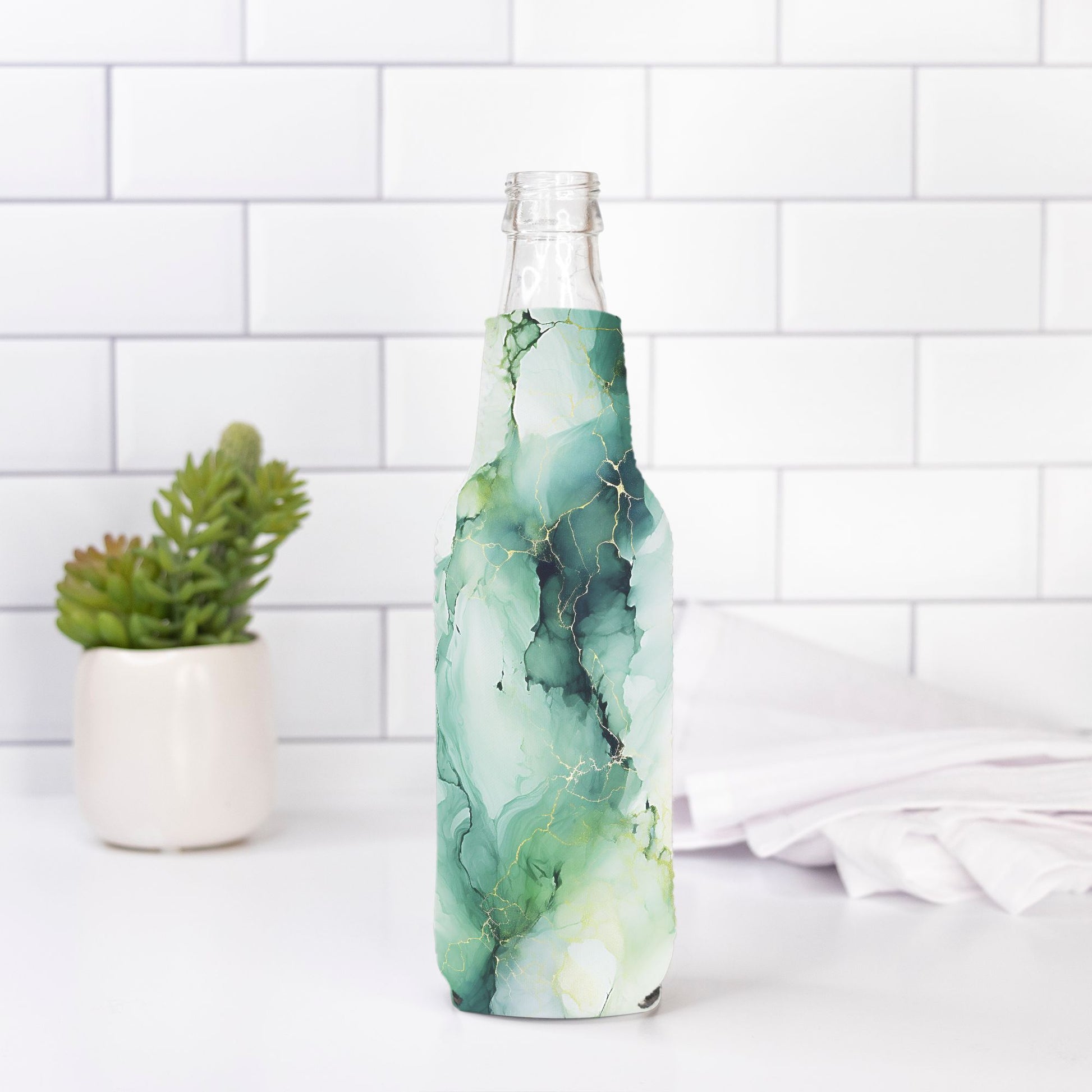 Enhance your bottle's look with our Bottle Wrap - Green Marble from Designs On The Go. Featuring a stunning green marble design, this durable wrap adds a touch of elegance to your hydration routine. Perfect for standing out with style, it's the ideal accessory for any bottle.