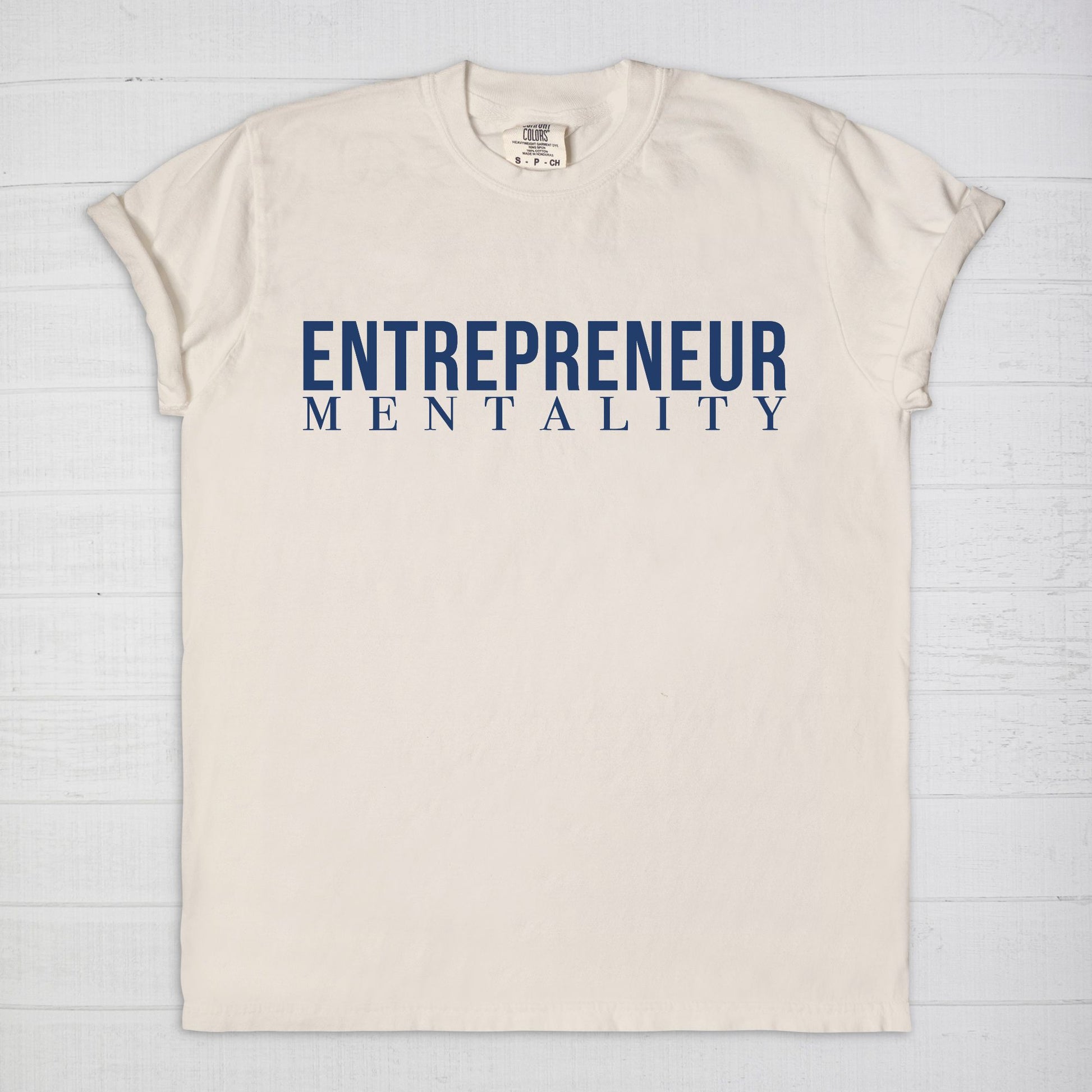 Showcase your drive with the Comfort Color Tee 1717 - Entrepreneur Mentality from Designs On The Go. This comfortable, high-quality tee embodies your ambitious spirit with a sleek design, perfect for daily wear. Elevate your casual wardrobe and inspire success with every step you take.