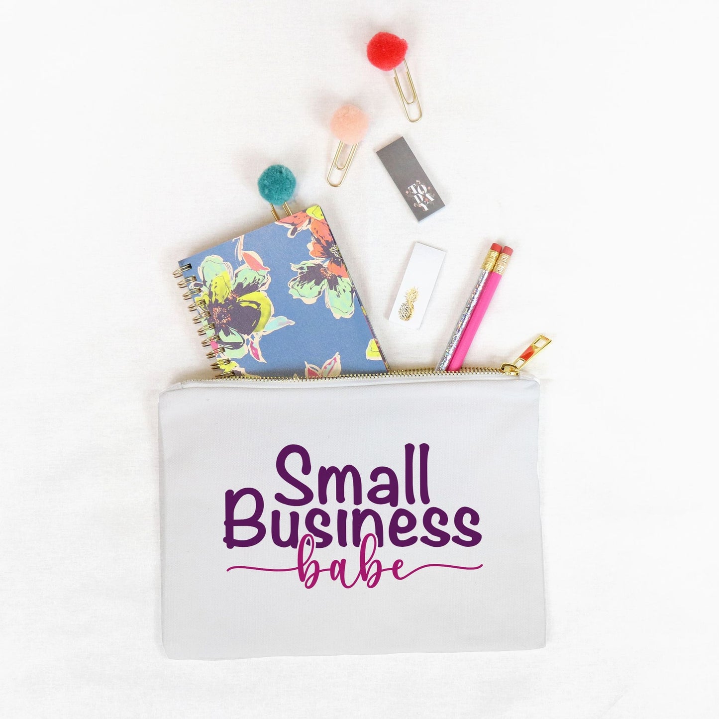 Showcase your small business pride with our Canvas Zipper Bag - Small Business Babe from Designs On The Go. Perfect for organizing your essentials, this durable and stylish bag is ideal for entrepreneurs on the go. Carry your must-haves with confidence and style.