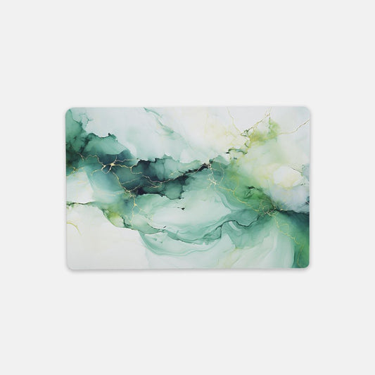 Enhance your workspace with the Desk Mat – Small (18″ x 12″) - Green Marble from Designs On The Go. This stylish mat features a stunning green marble design, protecting your desk while adding a touch of elegance. Perfect for any home or office setup, it combines functionality and aesthetic appeal for a productive environment.